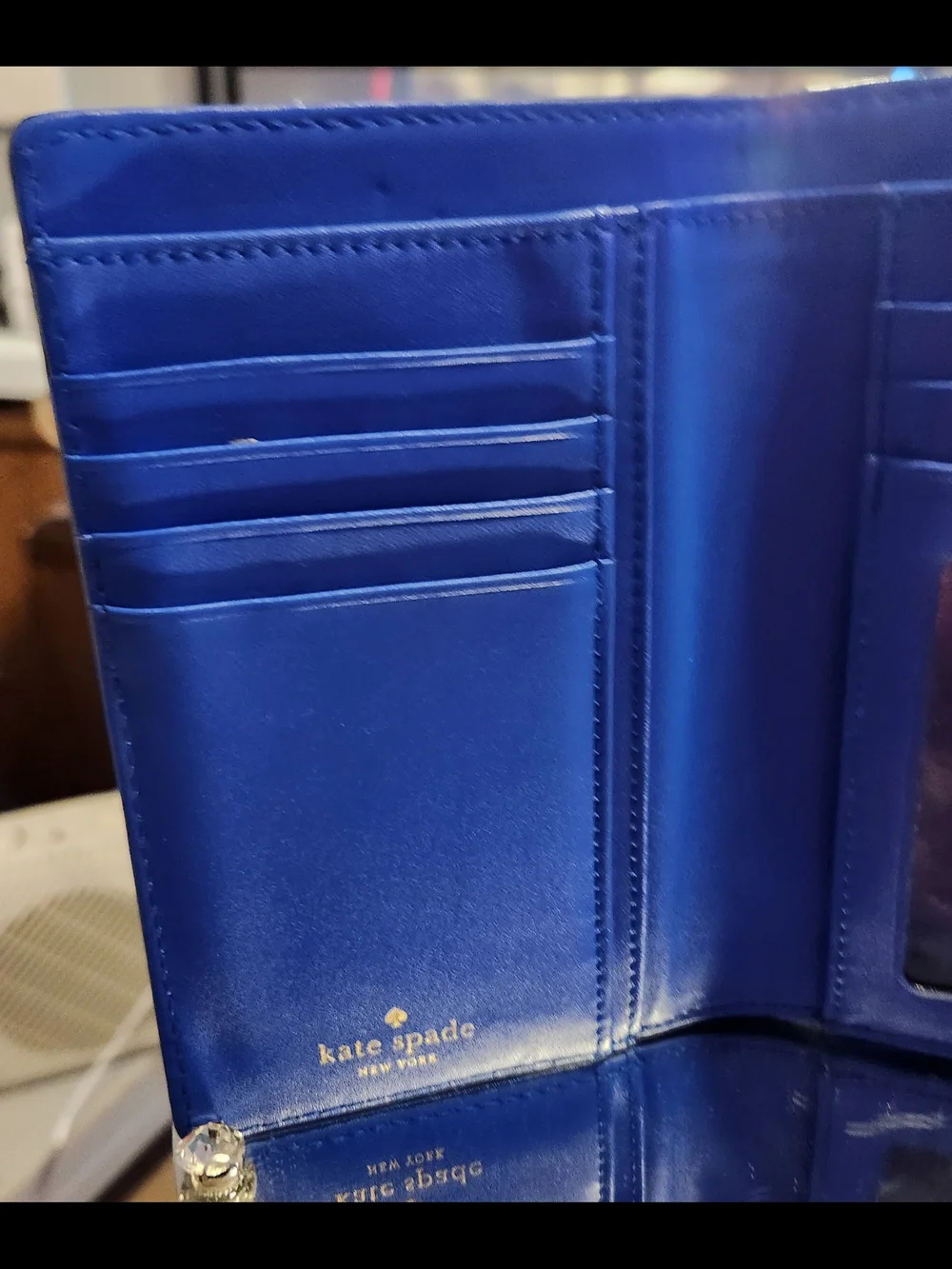 kate spade cobalt blue pebbled leather Tri-fold wallet